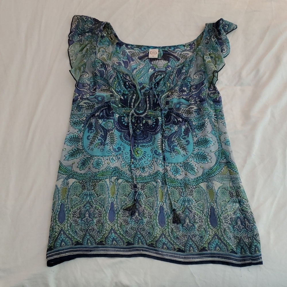 Sleeveless ruffle tunic top